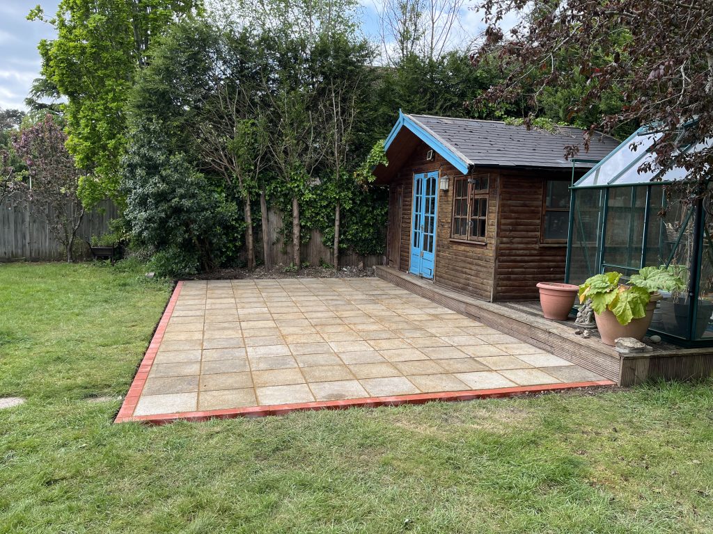 Reclaimed concrete patio slabs laid on a full mortar bed
